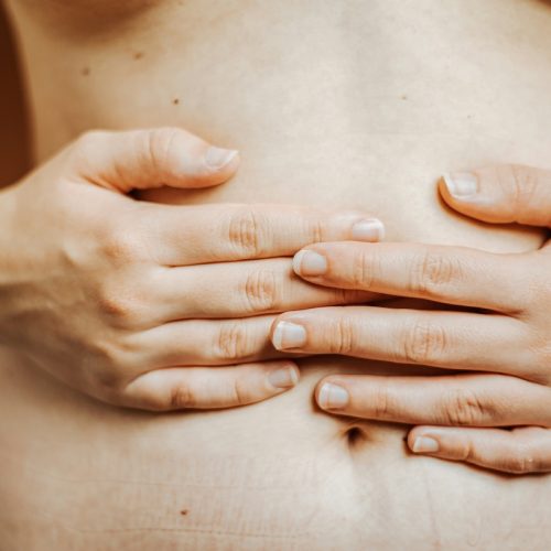 The GI-MAP Gut test - woman holding stomach